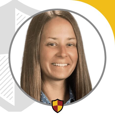 Professional headshot of a smiling woman with long straight hair.