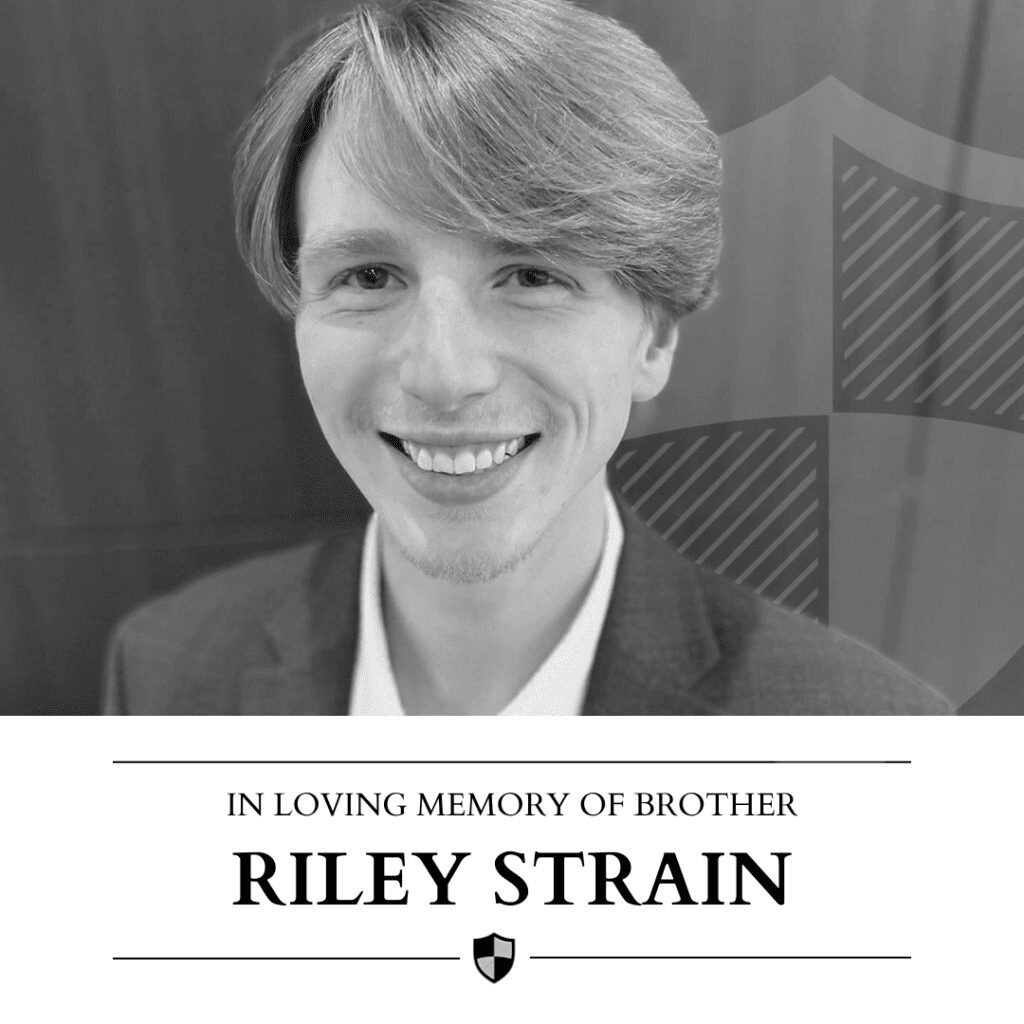 Memorial image honoring Riley Strain with a smiling portrait.
