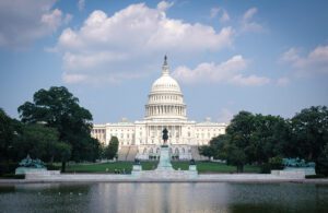 U.S. Capitol building with reflecting pool.